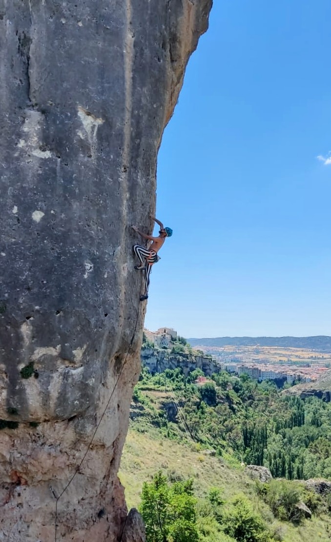 A rock climber projecting a climb in Spain
