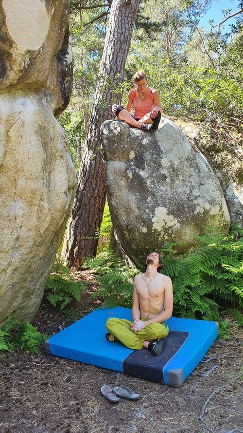 Two people bouldering in Bas Cuvier, Fontainebleau