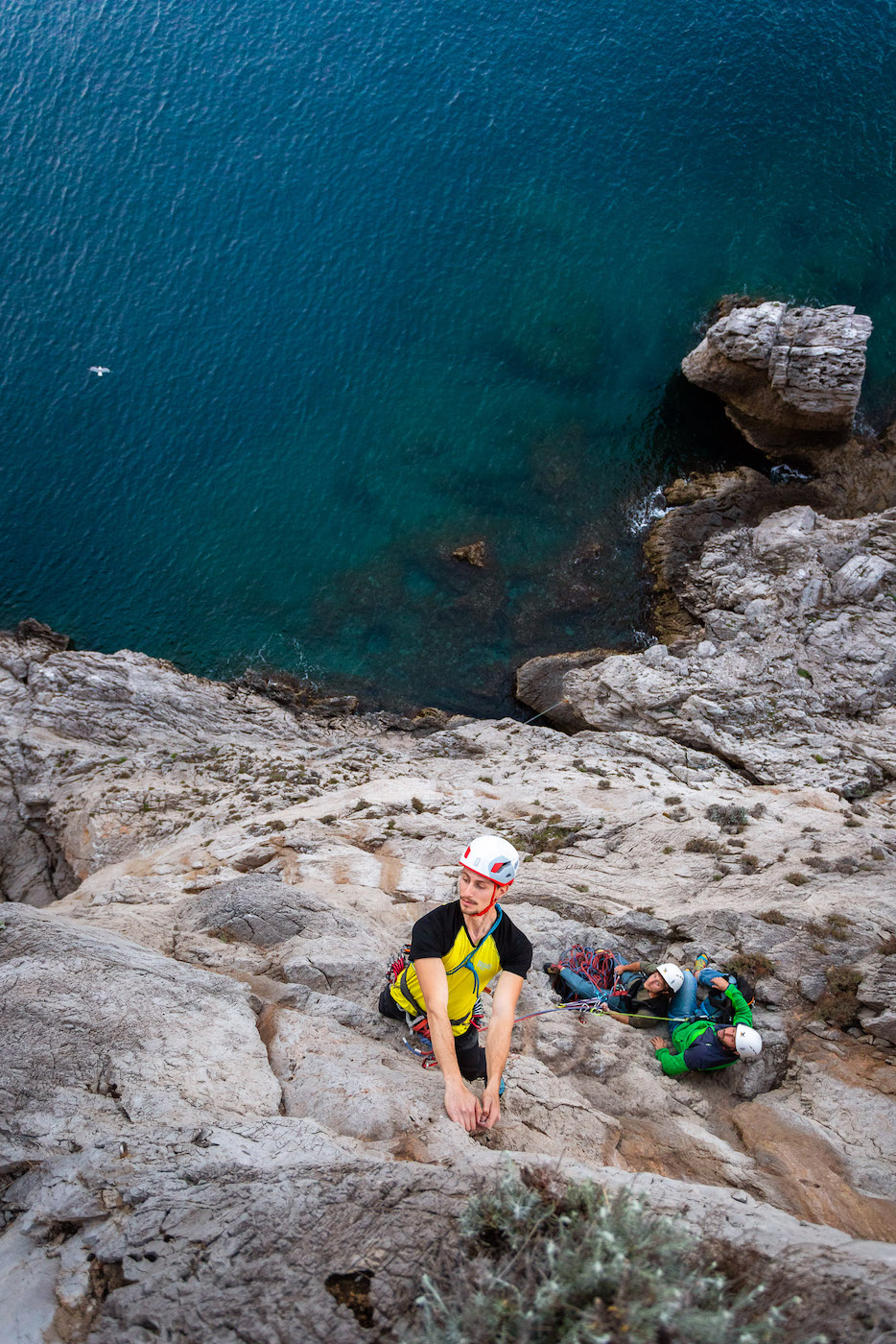 Climber on a multi-pitch route in Positano, Southern Italy