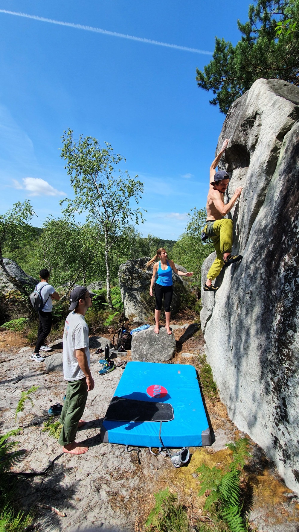 A group of people bouldering in Gorges D'Apremont