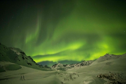 The Northern lights over the Alaskan mountains
