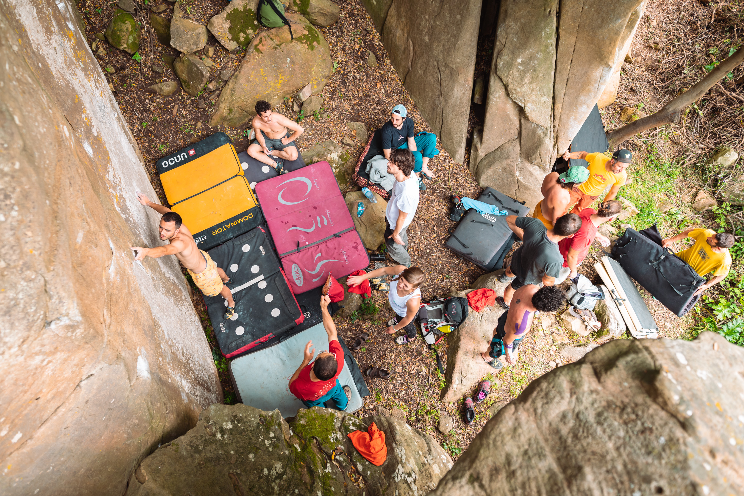 A group of rock climbers bouldering in Western Sicily