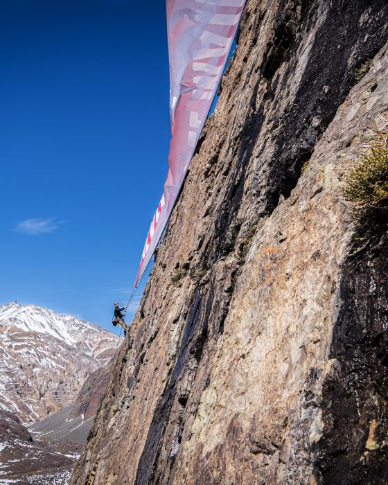 Climber rappelling down a route in Cajon El Maipo, 
