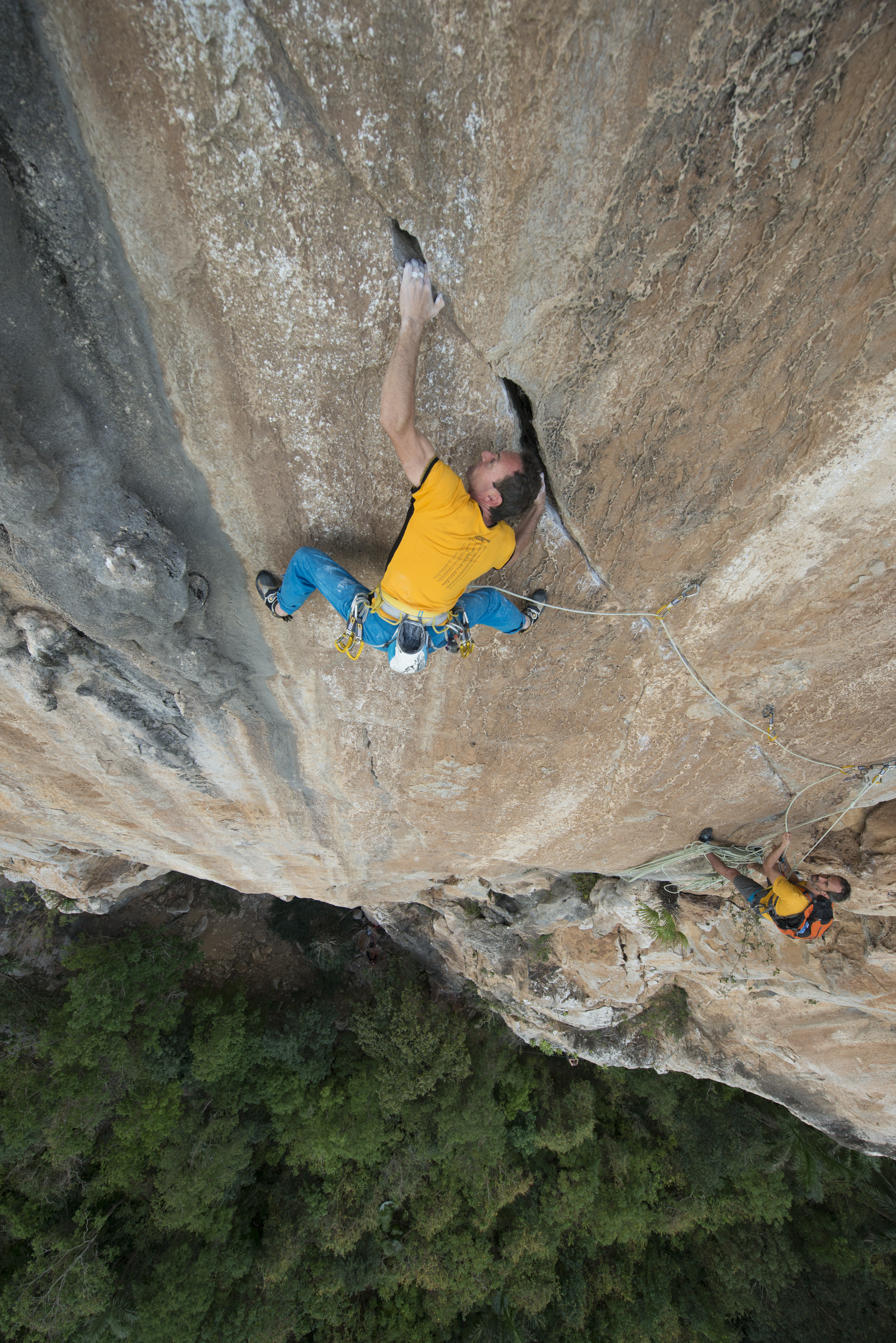 Two climbers on a multi-pitch climb in Vinales, Cuba