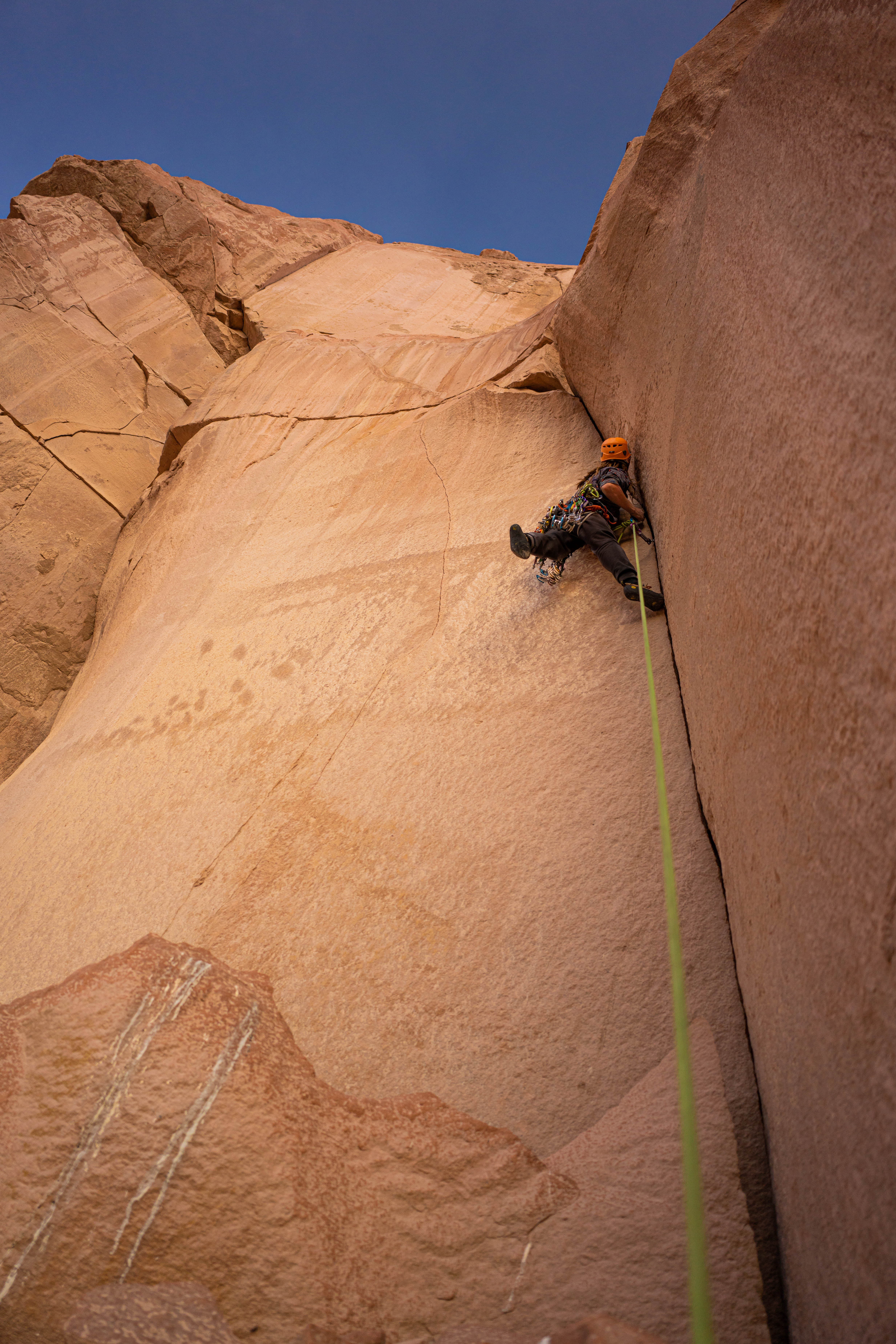 A climber crack-climbing in Northern Chile