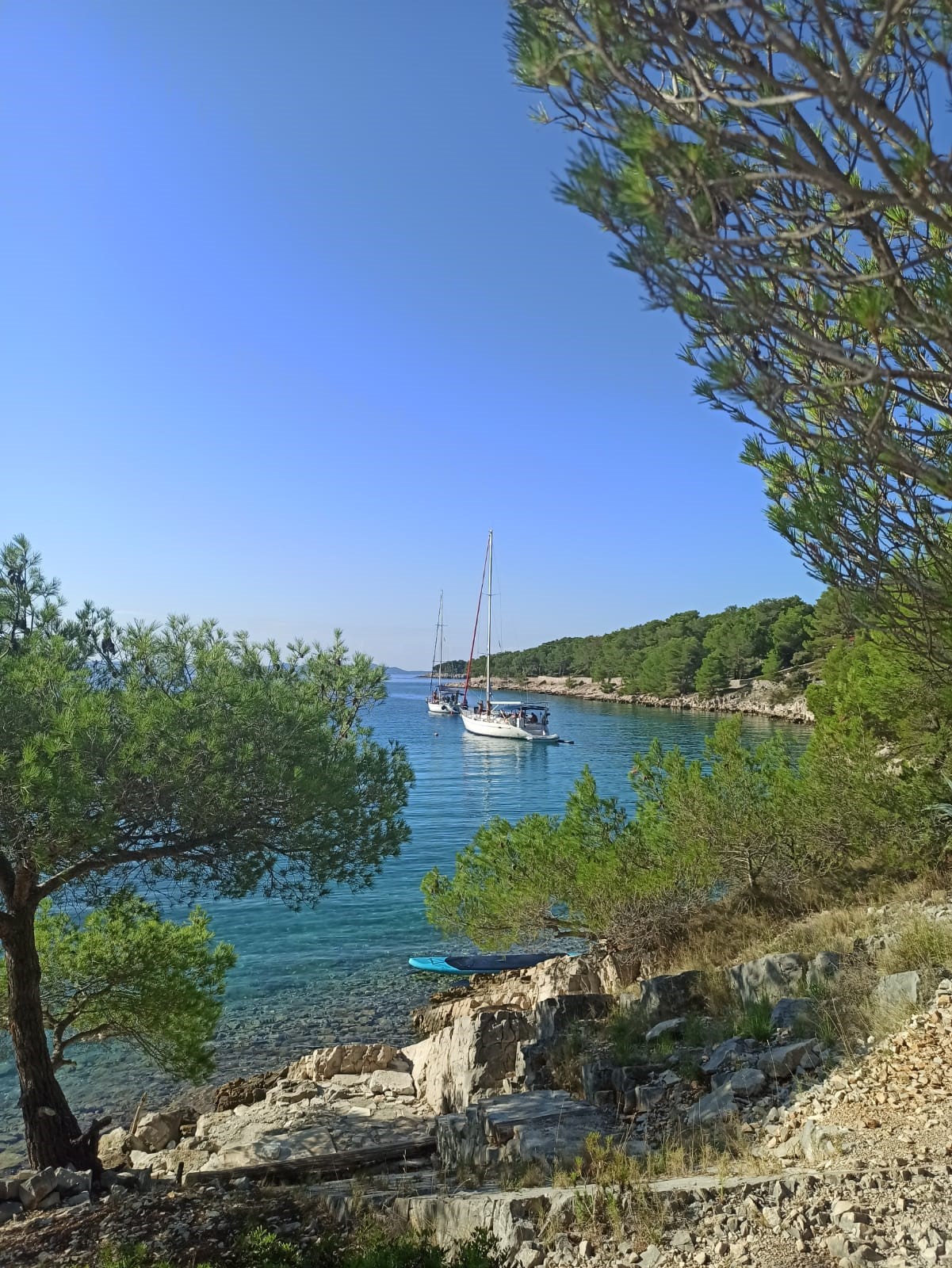 A sailboat near a rock climbing area in Dalmatia, Croatia