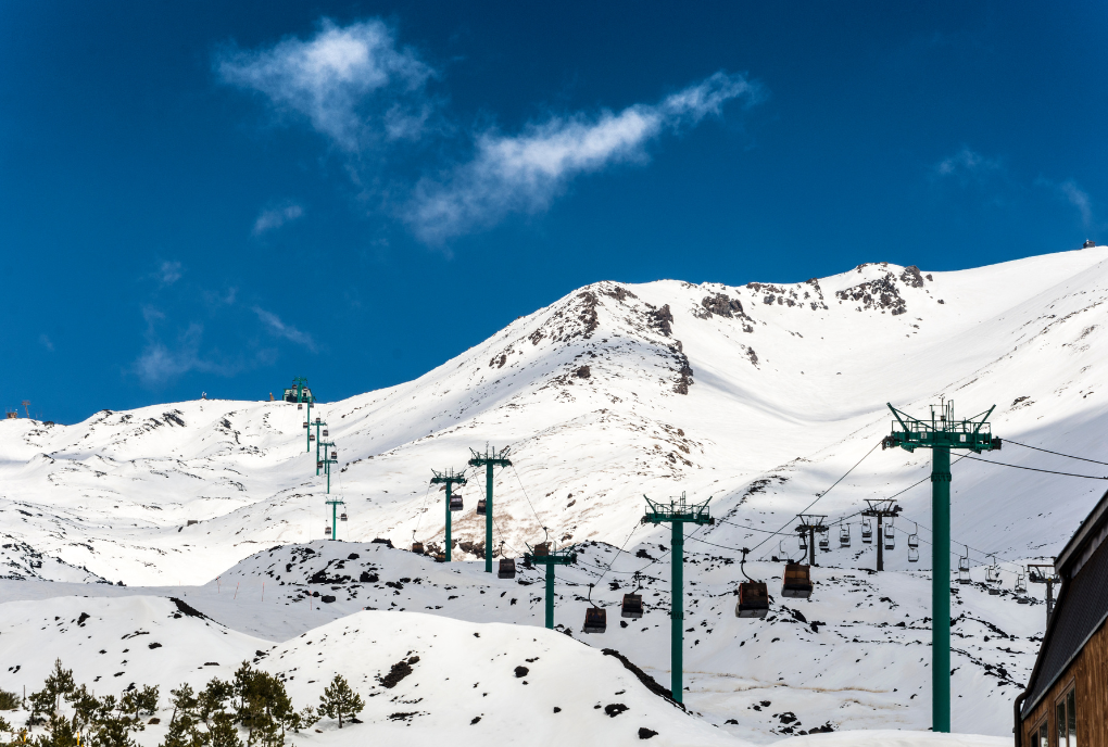 Ski lifts on Mount Etna under the snow