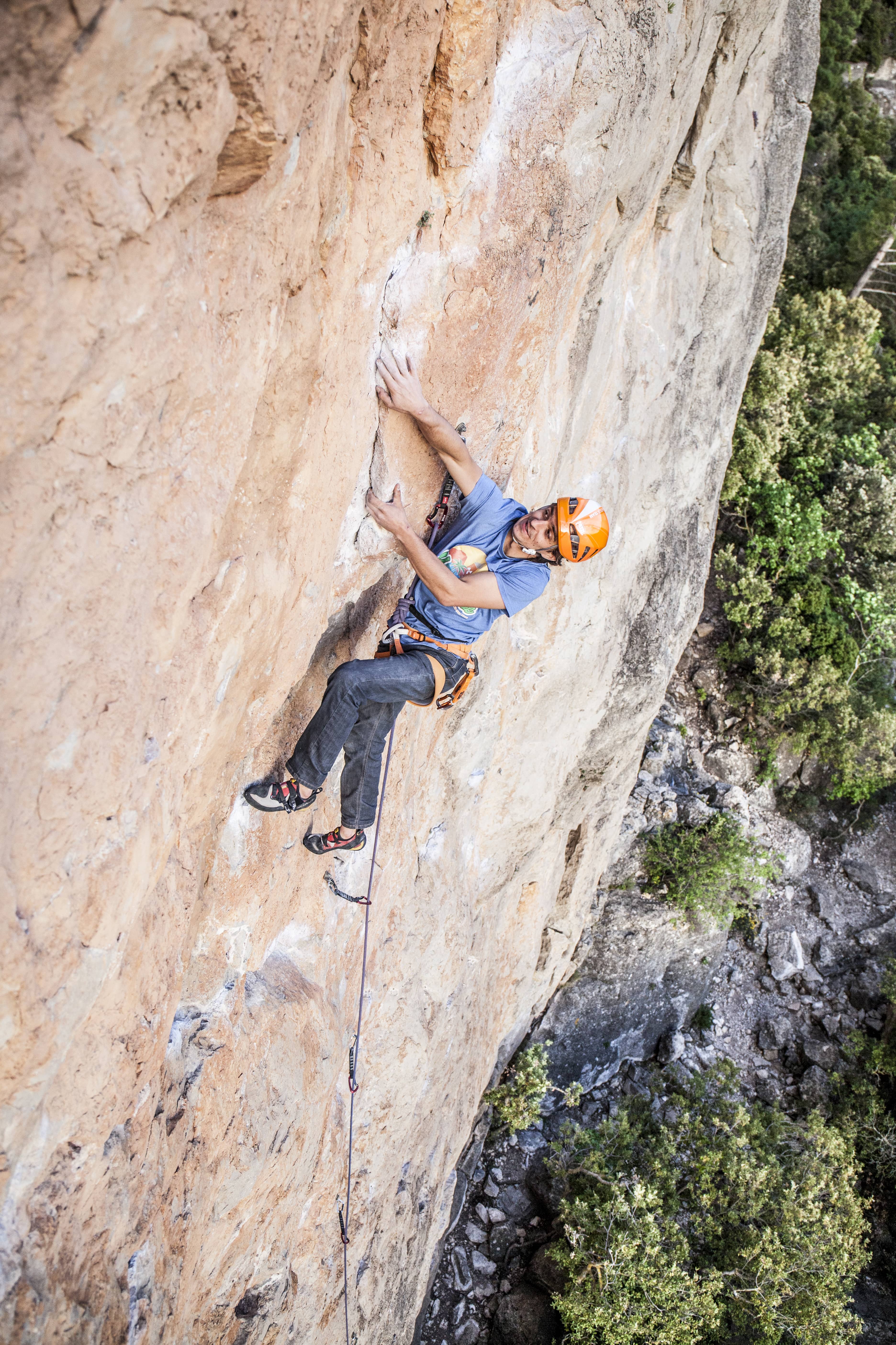 Close up shot of a person sport climbing in Arboli, Costa Dorada, Siurana