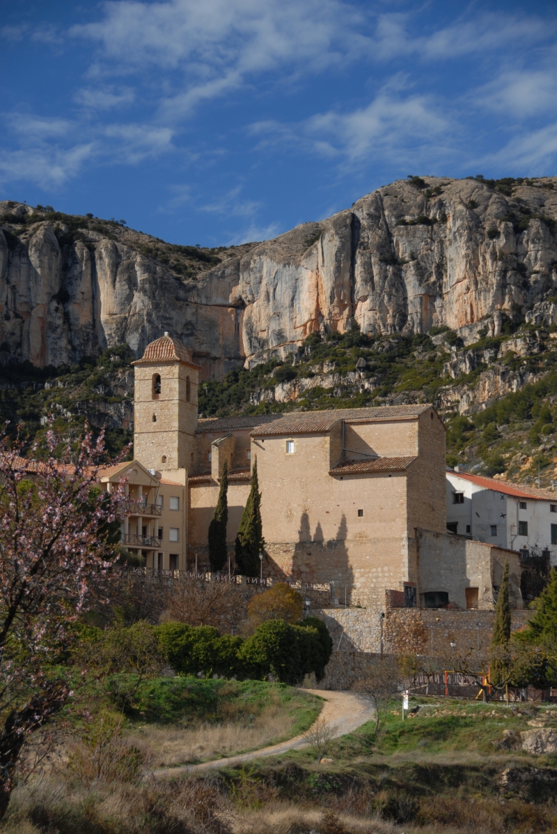 The town of prioriat in catalonia with cliffs in the background